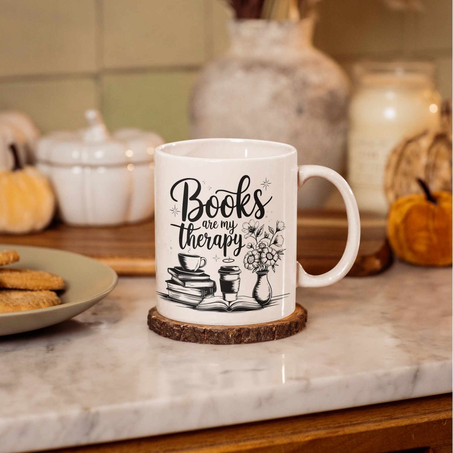 books are my therapy white mug on a kitchen worktop.