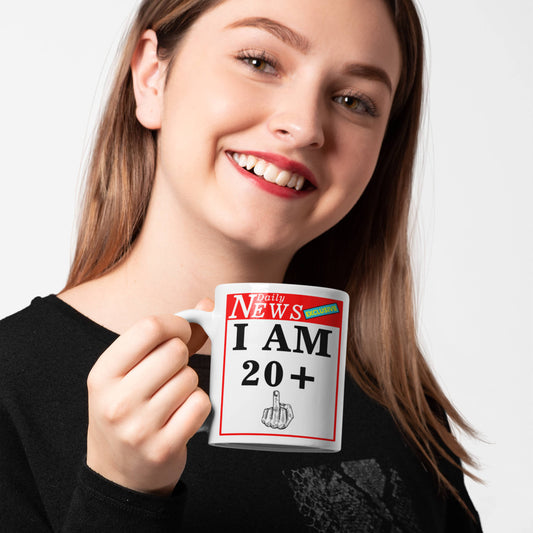 21st birthday white mug. 20 plus 1 middle finger held by young woman
