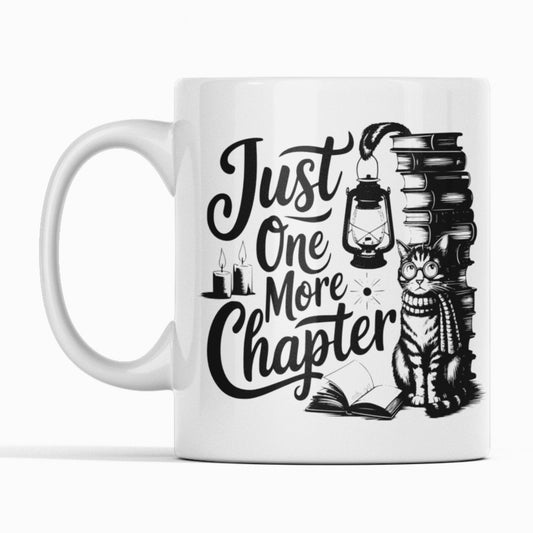 Whit mug. Black design. Pile of books with a cat and a lantern. Text Just one more chapter.