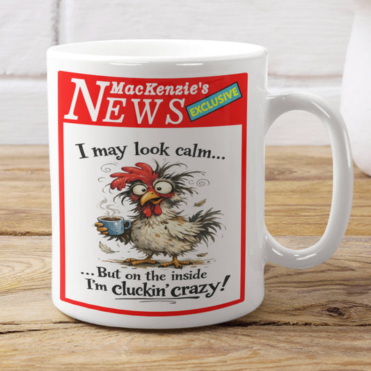 Mug with a cartoon rooster holding a cup and humorous text on a wooden surface.