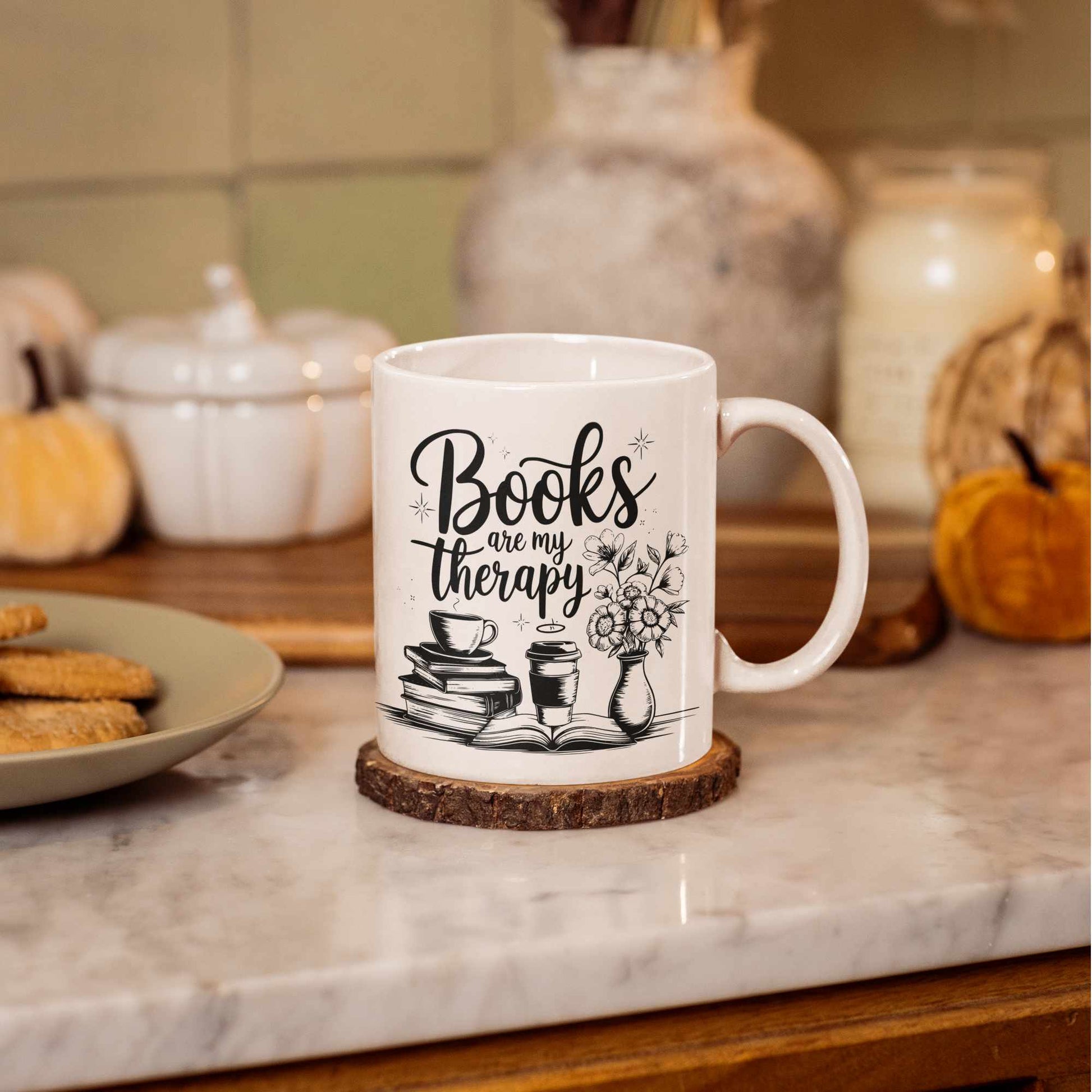 books are my therapy white mug on a kitchen worktop.
