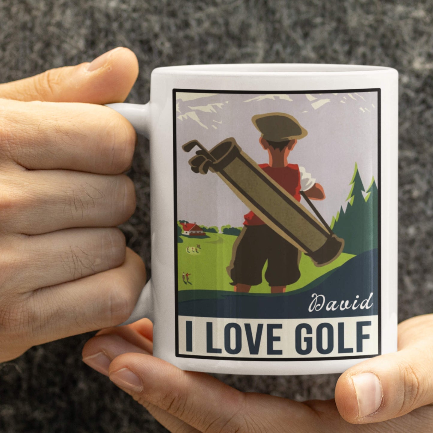 Person holding a mug with a golf-themed design and text 'I Love Golf'.