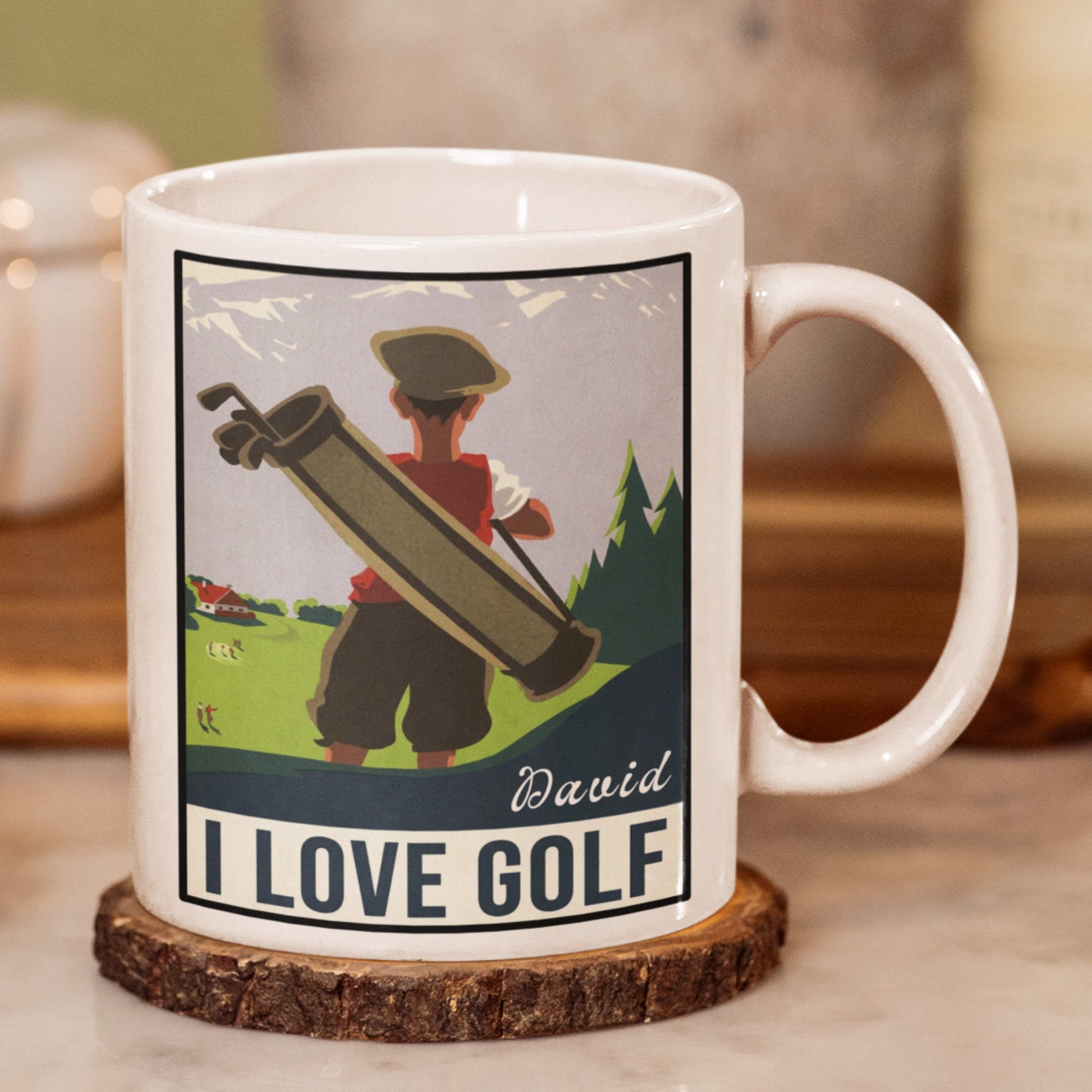 White mug with golf-themed design and 'I Love Golf' text on a wooden coaster.